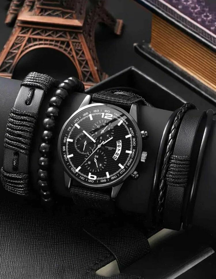 9270-products-64b7f86520125.jpg ساعة كوارتز بقرص مؤشر دائري و 3قطع اسوار - الصورة 1