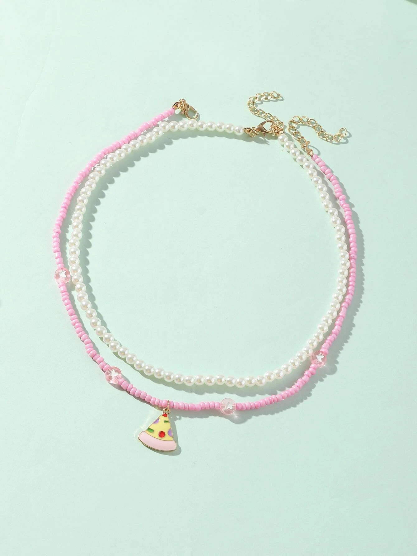 products1670657685.webp قلادة بنات لؤلؤ صناعي للبنات 2 قطع قلب اكسسوارات الولو للبنات للاطفال - الصورة 1